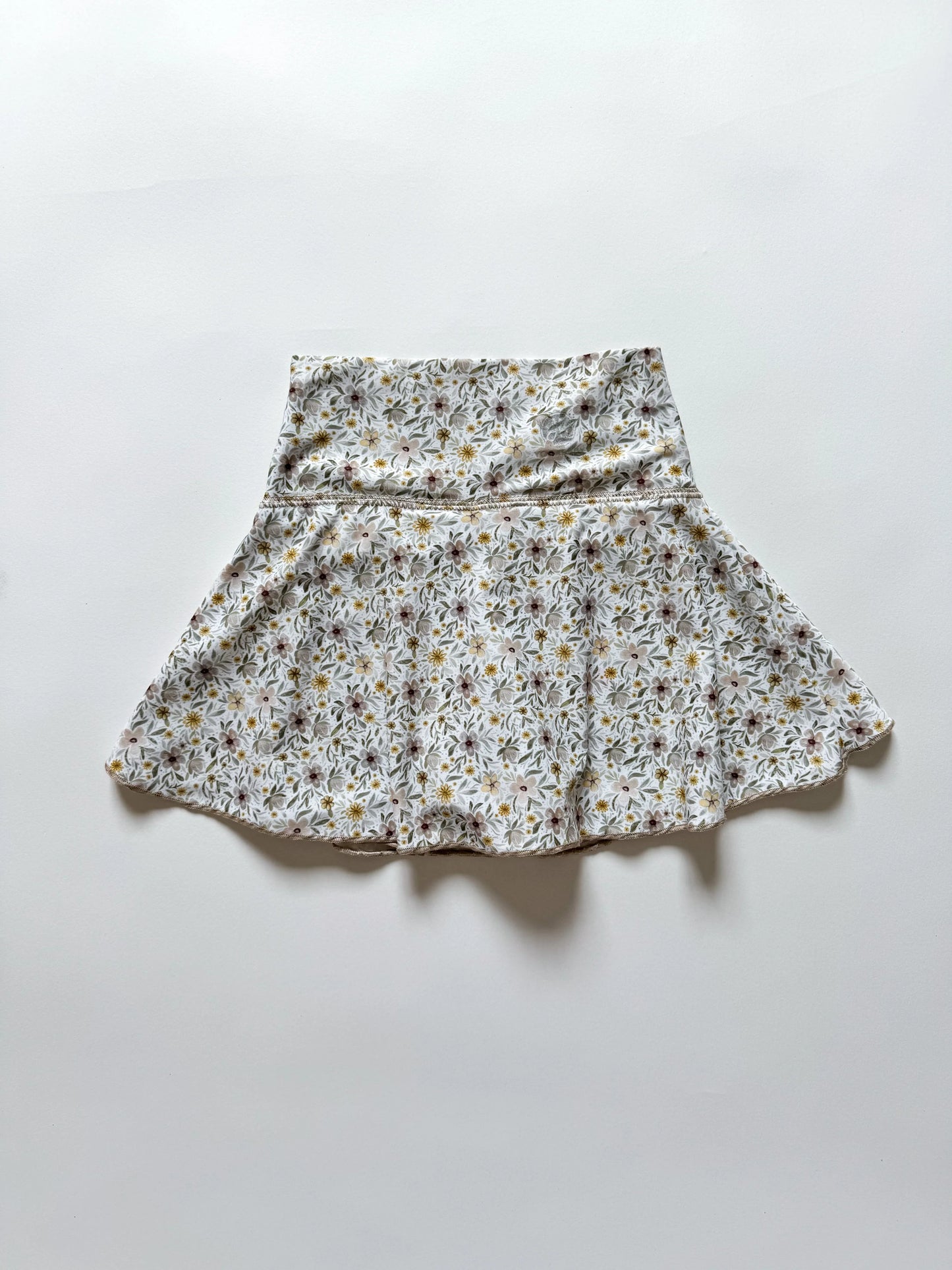 ALMOND FLORAL TENNIS SKIRT